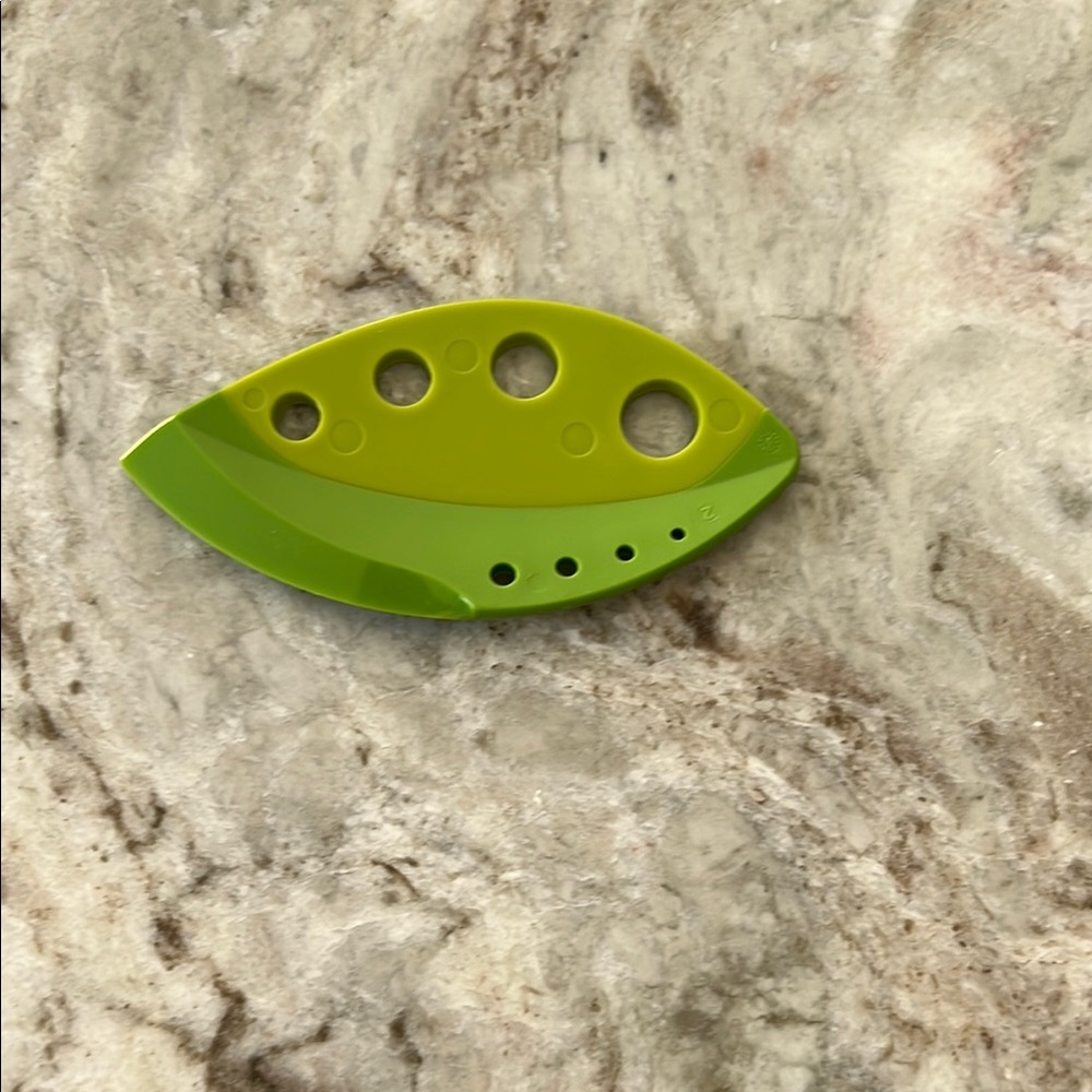 Green Leaf-Shaped Herb Tool